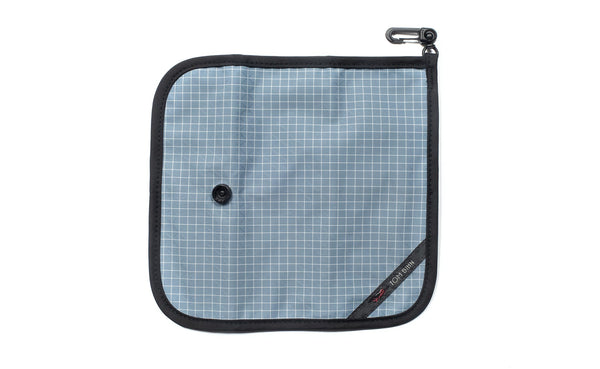 The back of a Tool Pen Wrap in Tidal (pale blue with white grid) 200 Halcyon.